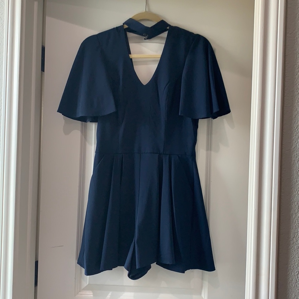 Navy blue romper. Small